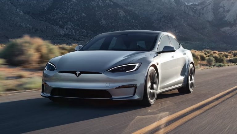 The Tesla car goes to the buyer, marking the first delivery of company's entirely independent vehicles The Tesla car goes to the buyer, marking the first delivery of company's entirely independent vehicles